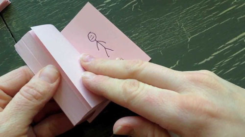 hand holding a sticky paper