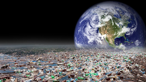 earth with plastic bottles in the space